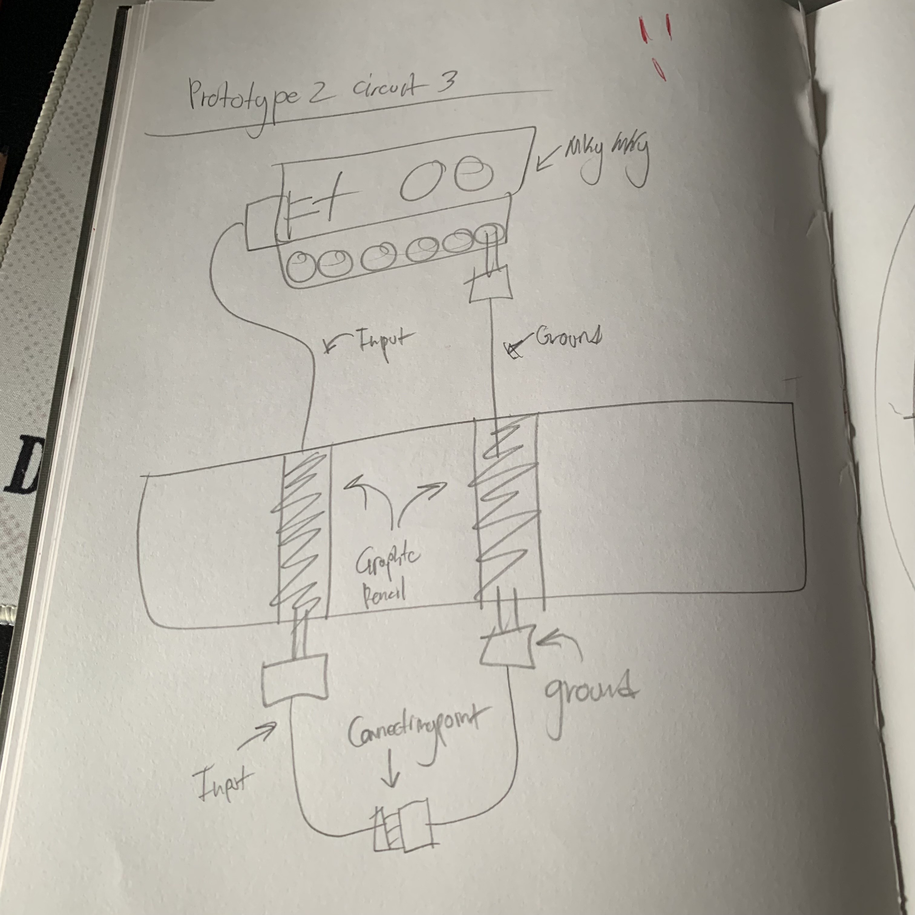 Initial sketch using graphite pencil to create a circuit.