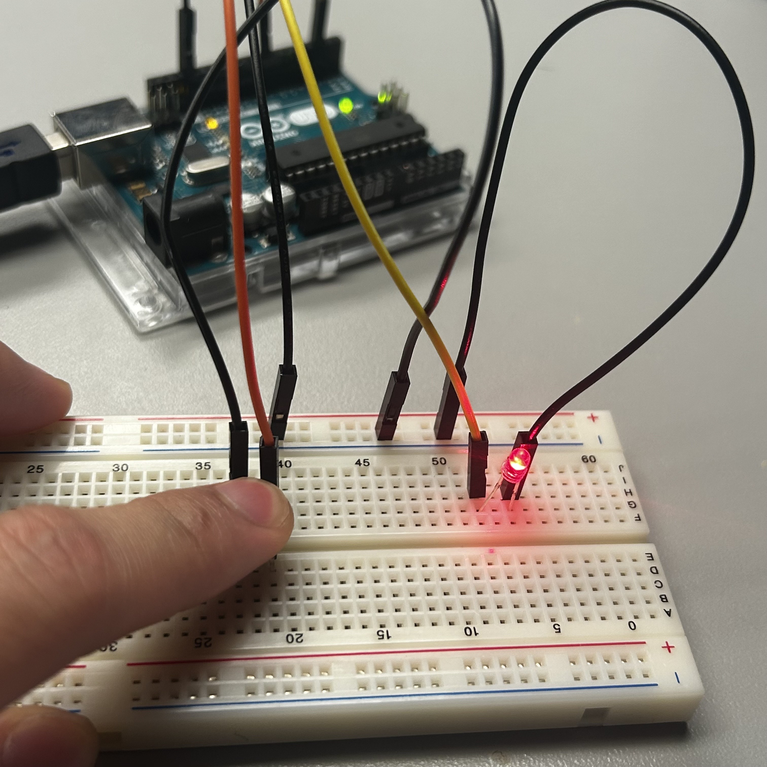 My final successful connection but, implementing a physical interaction via a anolog button. LED light activates upon the button being pressed down.